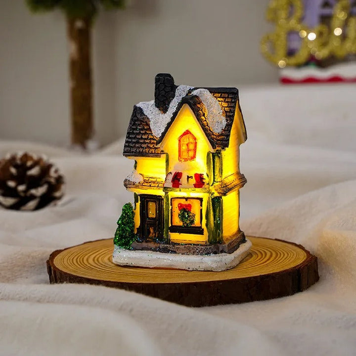 Den kompletta 6-delade julbyn med hus & figurer, alla med inbyggd lysande LED-belysning.