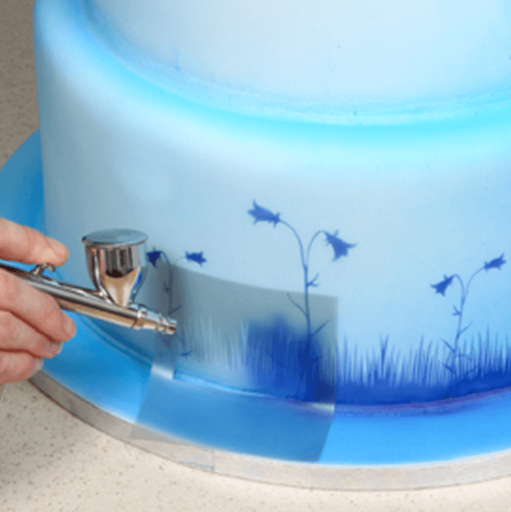 Komplett airbrushkit med kompressor och munstycken för konditorivarors design