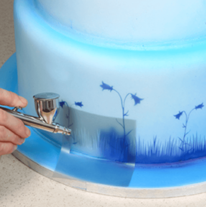 Komplett airbrushkit med kompressor och munstycken för konditorivarors design