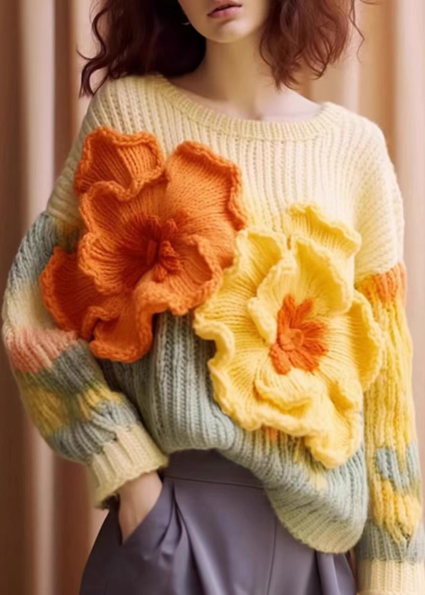 Bekväm långärmad aprikos kardigan med ledig passform. Stilfullt blommönster, idealisk för damers vardagsstil.