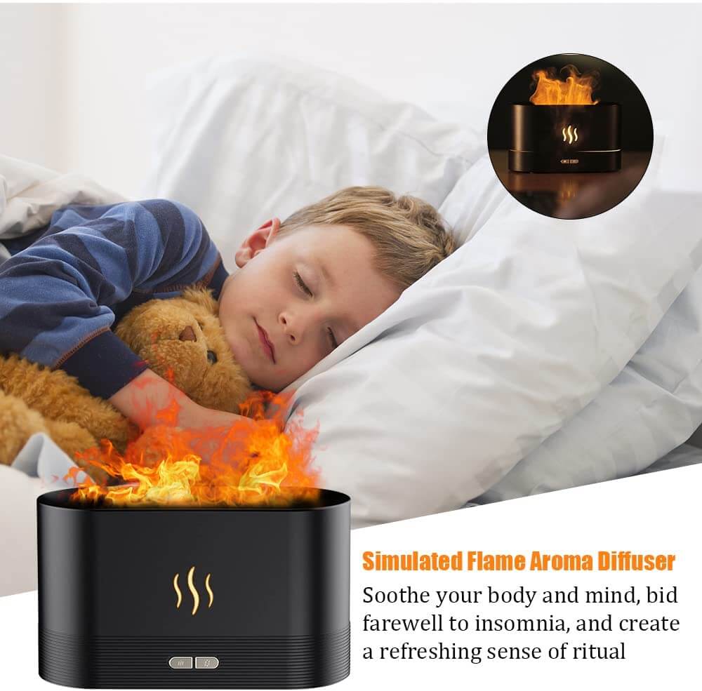 Aromaterapi Eldeffekt Luftfuktare i bruk, med synlig ånga och glöd på mörkt underlag.