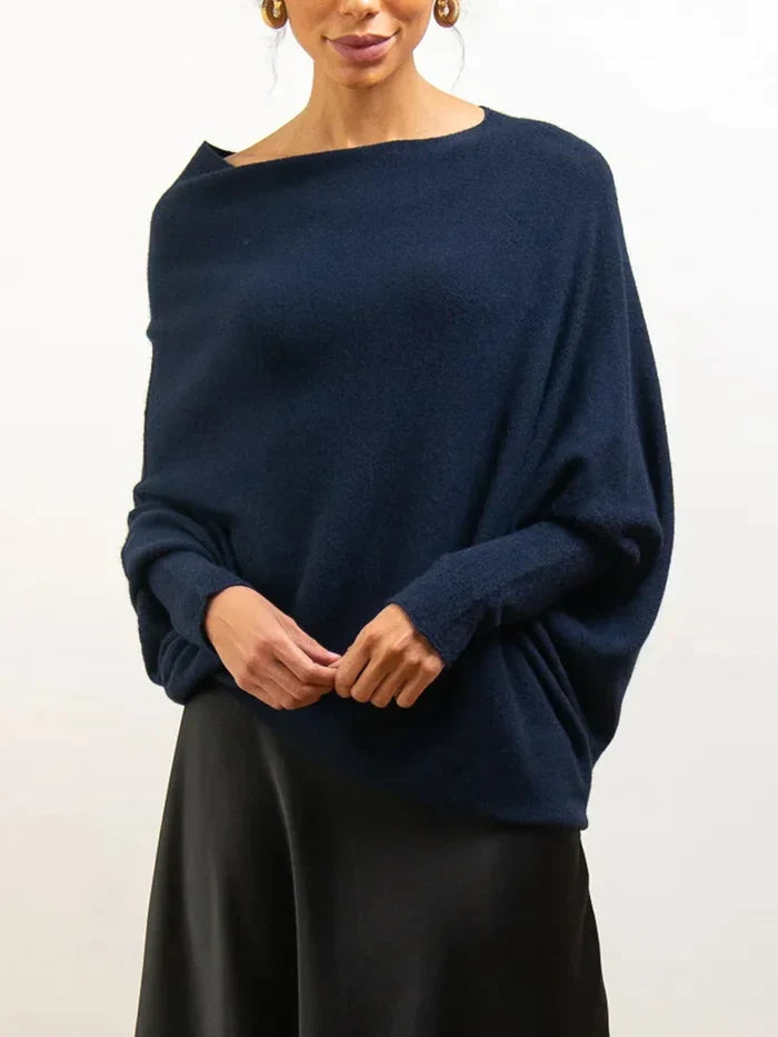 Mångsidig asymmetrisk damtröja, draperad för en modern look. Bekväm långärmad topp för alla tillfällen.