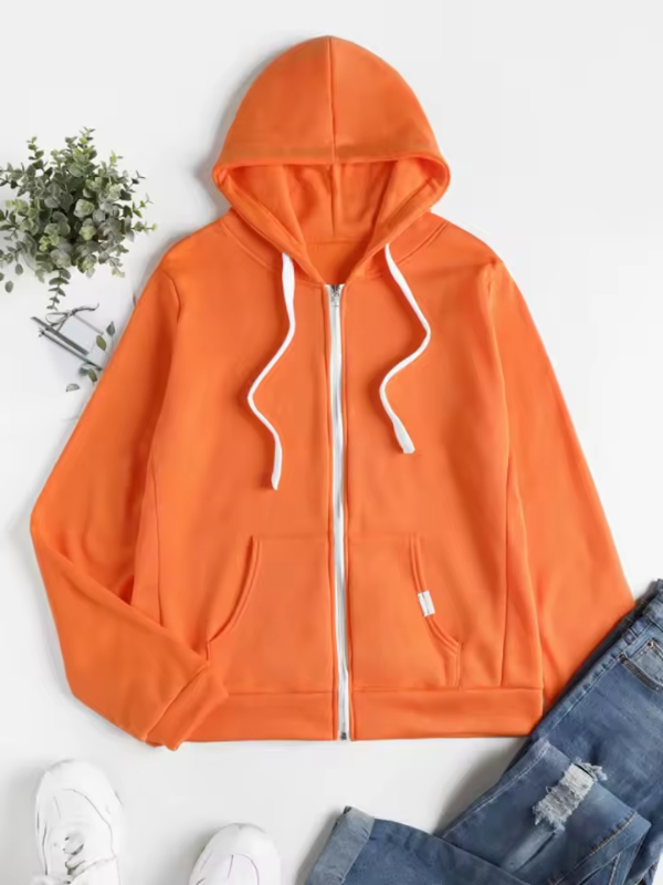 Bekväm zip-up huvtröja för damer, med praktiska fickor och huva. Idealisk för avslappnad vardagsstil.