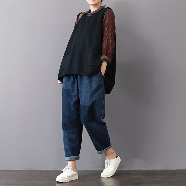 Damtröja med stora fickor och ledig passform, idealisk för en bekväm sommarlook. Ärmlös och chic.