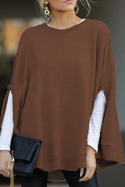 Bekväm pullover damtröja med moderna batwingärmar. En enfärgad, ledig långärmad tröja för dammode.