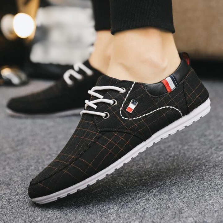 Stilrena grå slip-on herrskor, mångsidiga sneakers för mode och vardag.