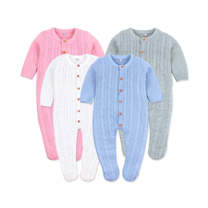 Baby stickad romper i grått, perfekt för komfort och stil under höst och vinter.