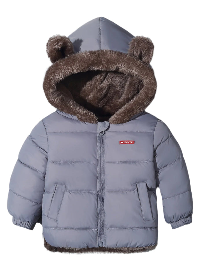 Bakifrån, en unisex barnjacka med söta björnöron som håller barnet varmt i vinterkul.