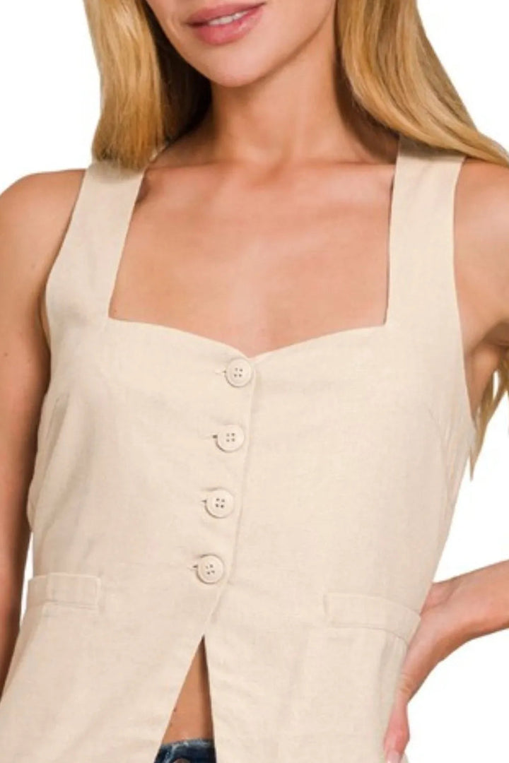 Fodrad beige damväst med knytning. Mångsidig ärmlös väst i rayon/bomull för elegant sommarstil eller business casual.