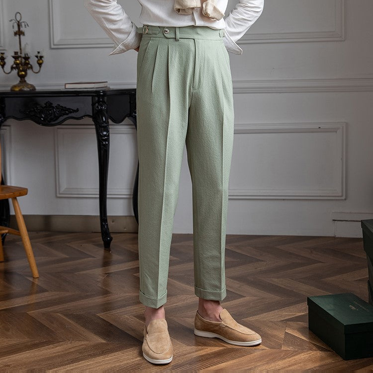Gröna högmidjade vintagebyxor för kvinnor. Eleganta raka ben, perfekt för retromode.