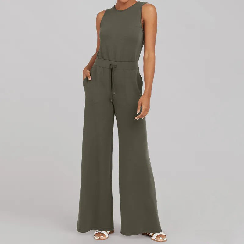 Trendig dam jumpsuit med justerbart bälte. Kortärmad design, lös passform & breda ben för sommar & fritid.