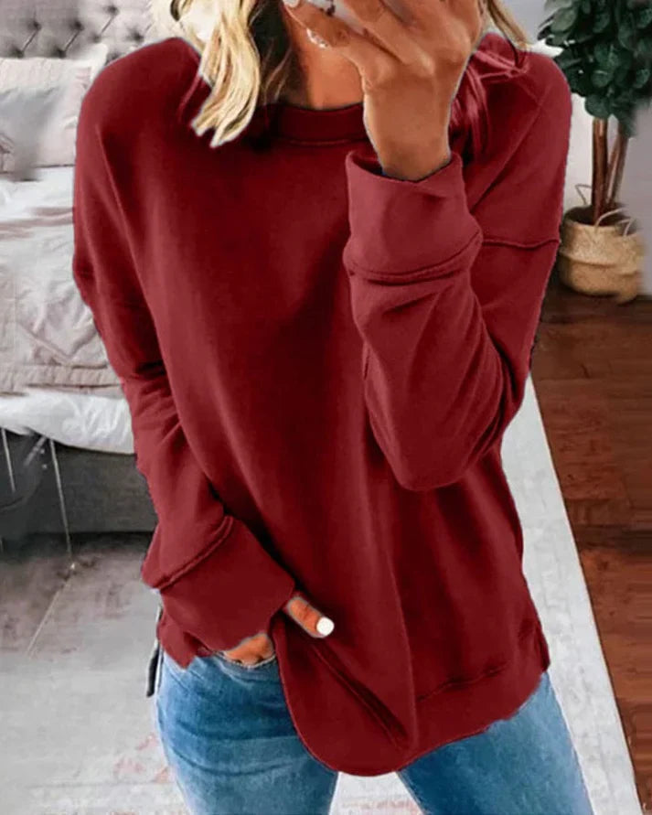 Färgstark dam sweatshirt med löst snitt. Idealisk för en bekväm och trendig fritidsstil på hösten.