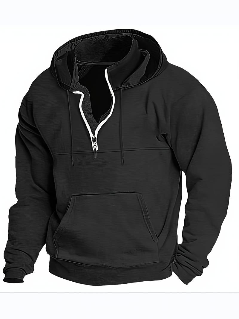 Man bär en avslappnad herrhoodie, visar komfort och stil för en ledig dag och vardagsstil.
