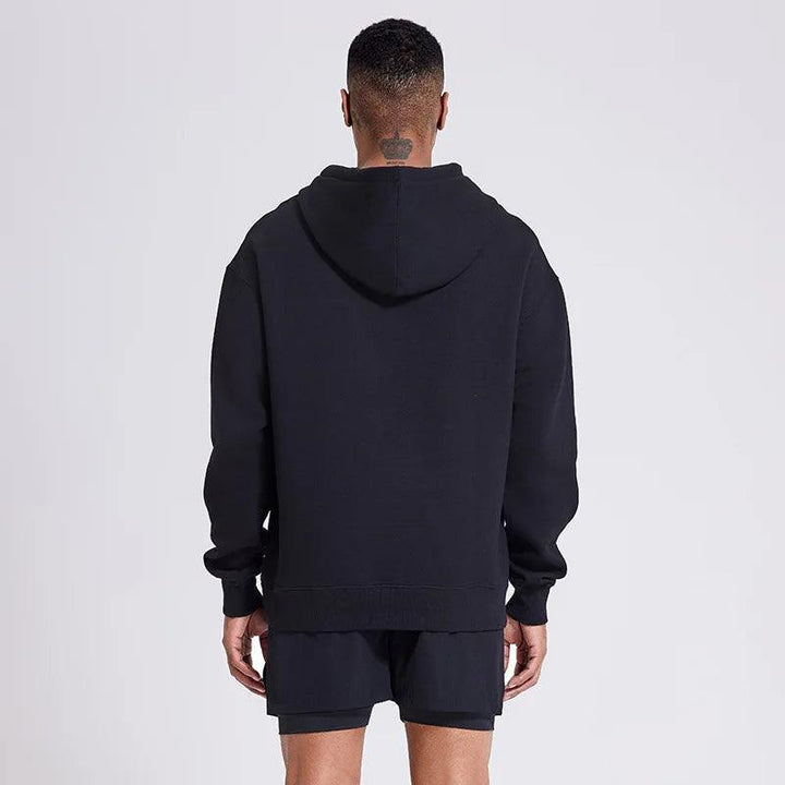 Snygg herrhoodie bakifrån, med bekväm passform. Unisex-tröja för alla dagar.