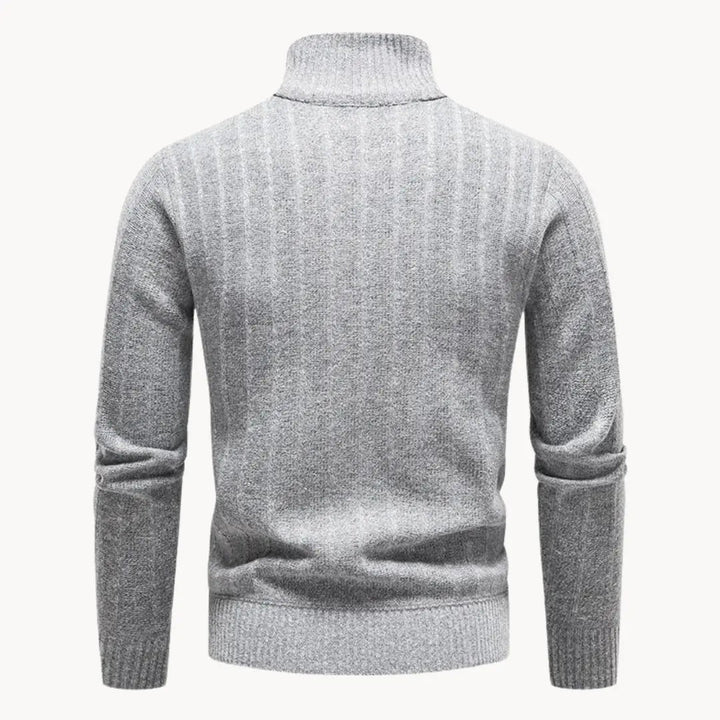Stilren herrtröja med kvartsdragkedja i modern design. Mångsidig för herrmode och sport.