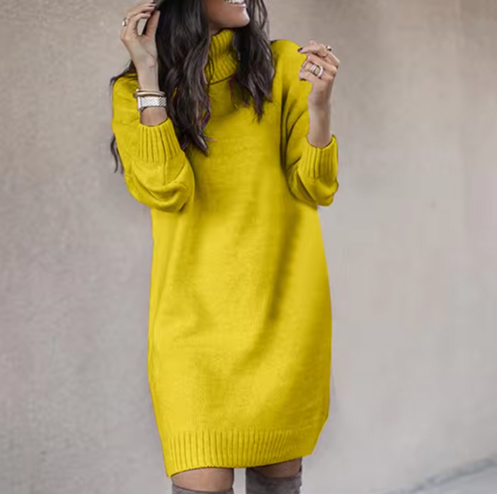 Elegant knälång tröjklänning för dam i höstmode, med krage och långa ärmar, både stilren och bekväm.