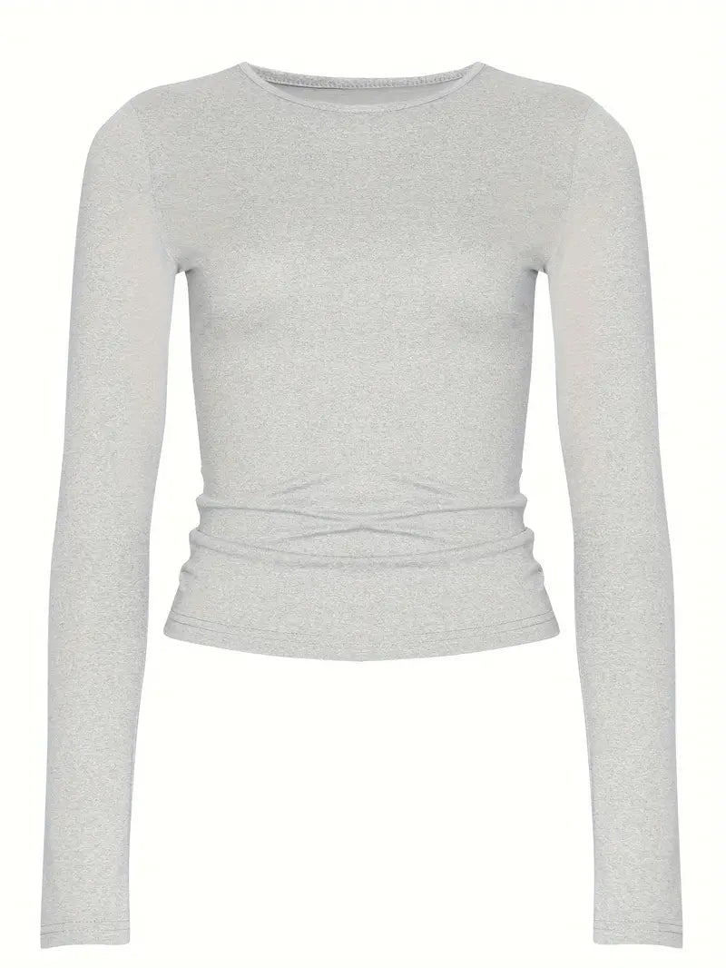 Mångsidig långärmad t-shirt för dam, monokrom design som enkelt matchas för avslappnad eller elegant stil.