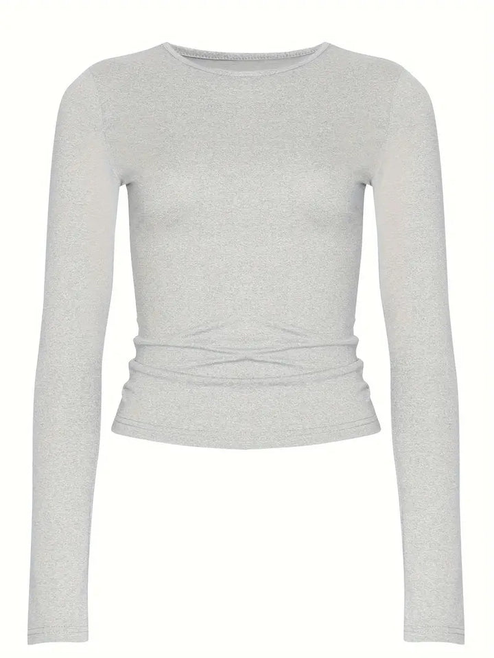 Mångsidig långärmad t-shirt för dam, monokrom design som enkelt matchas för avslappnad eller elegant stil.