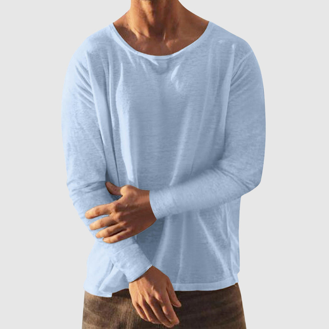 Stilren rundhalsad herrtröja i mode för män. Långärmad design, perfekt för en snygg och bekväm look.