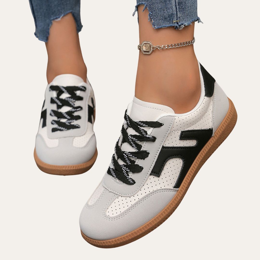Stilfulla damsneakers för vardagsbruk. Ergonomisk design med fotvalvsstöd för optimal komfort.