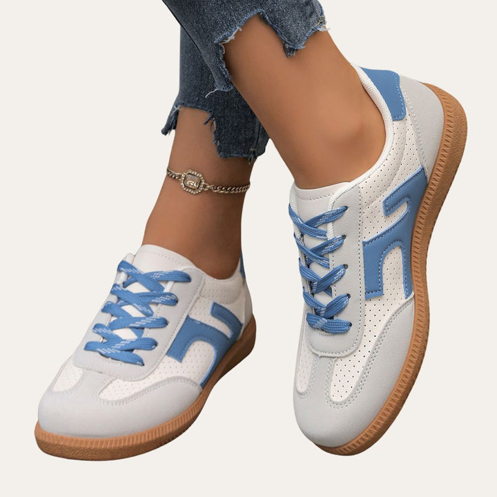 Promenadskor för kvinnor med fotvalvsstöd. Bekväma sneakers perfekta för fritid och aktiva dagar.