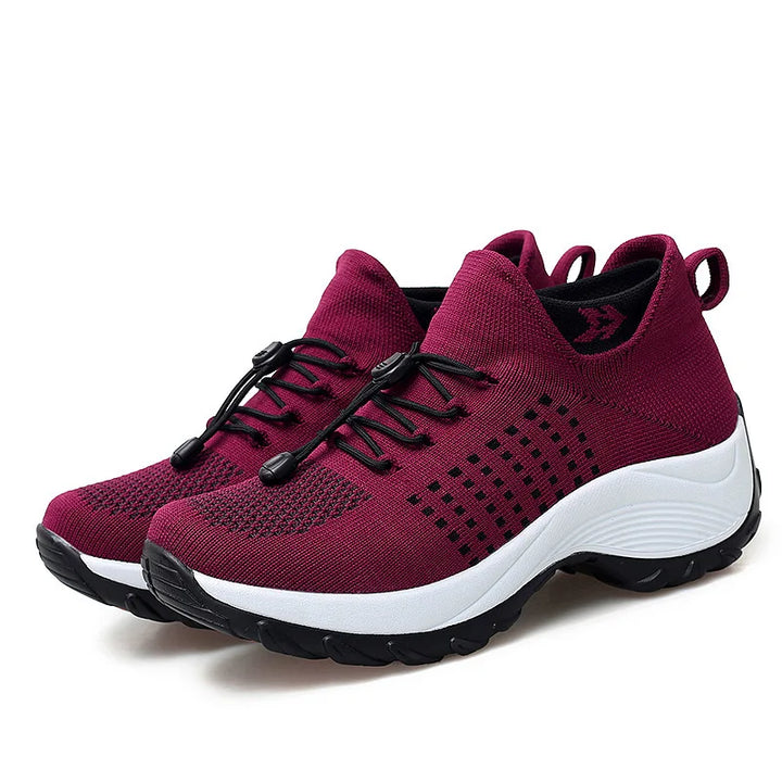 Stilrena plattformssneakers med modern design för dam, bekväma och trendiga fritidsskor.