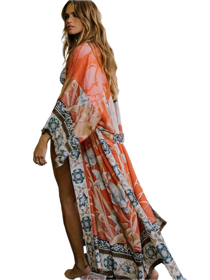Blommig kimono för dam, lätt & elegant, perfekt som strandkimono eller luftig sommaröverdel.