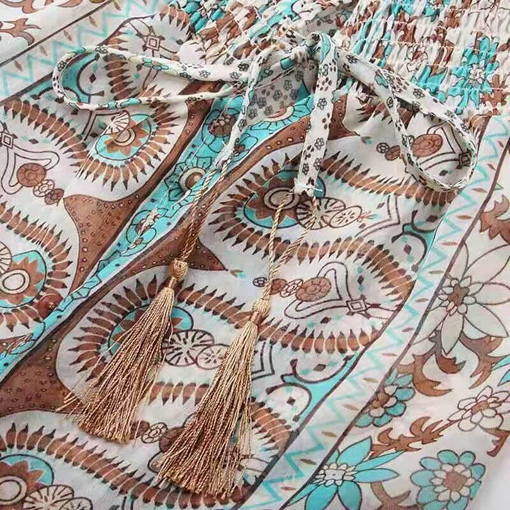 Elegant blommig maxiklänning, chiffongklänning för dam med bohemisk stil och v-hals.
