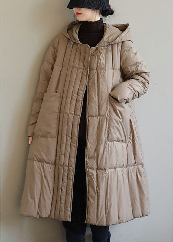 Värmande boho vinterjacka för dam, med praktiska lösa fickor. Perfekt för kallare dagar, stilren design.