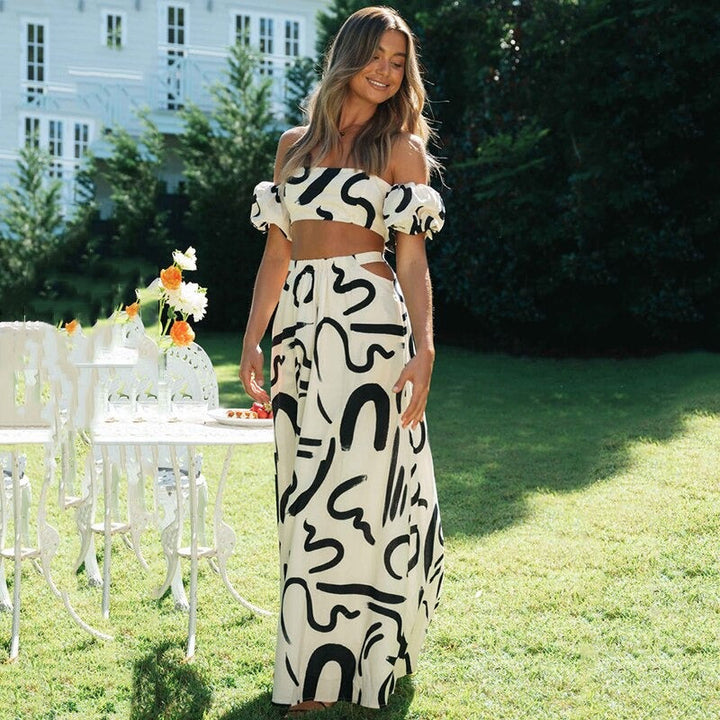 Kvinnors boho outfit: chic crop topp & matchande långkjol. Idealisk för strand- eller semesterkläder.