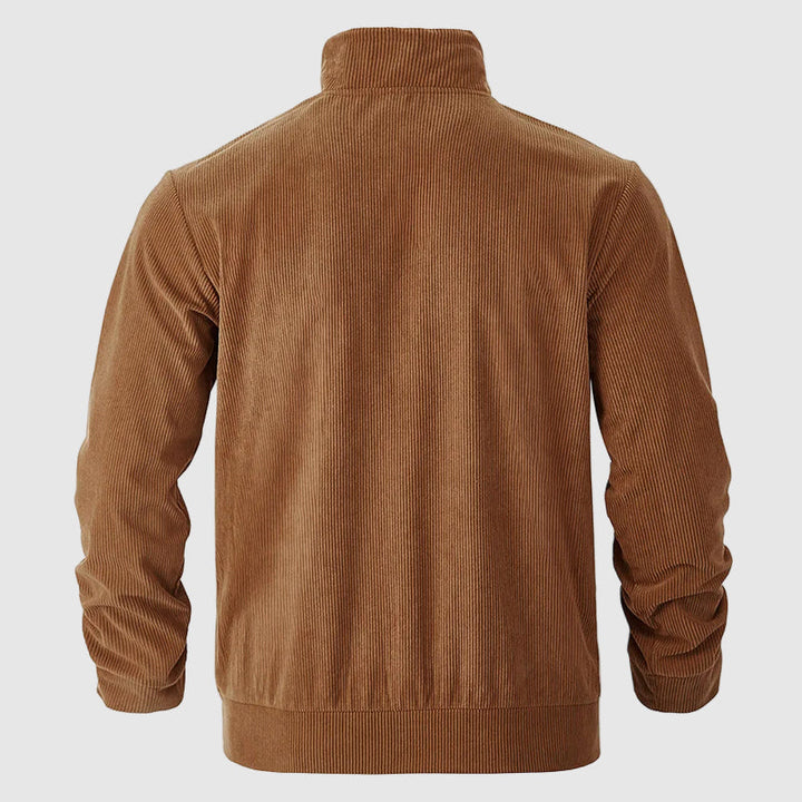 Herr corduroyjacka med retrokänsla. Trendig kordrock för klassisk mode och tidlösa herrkläder.