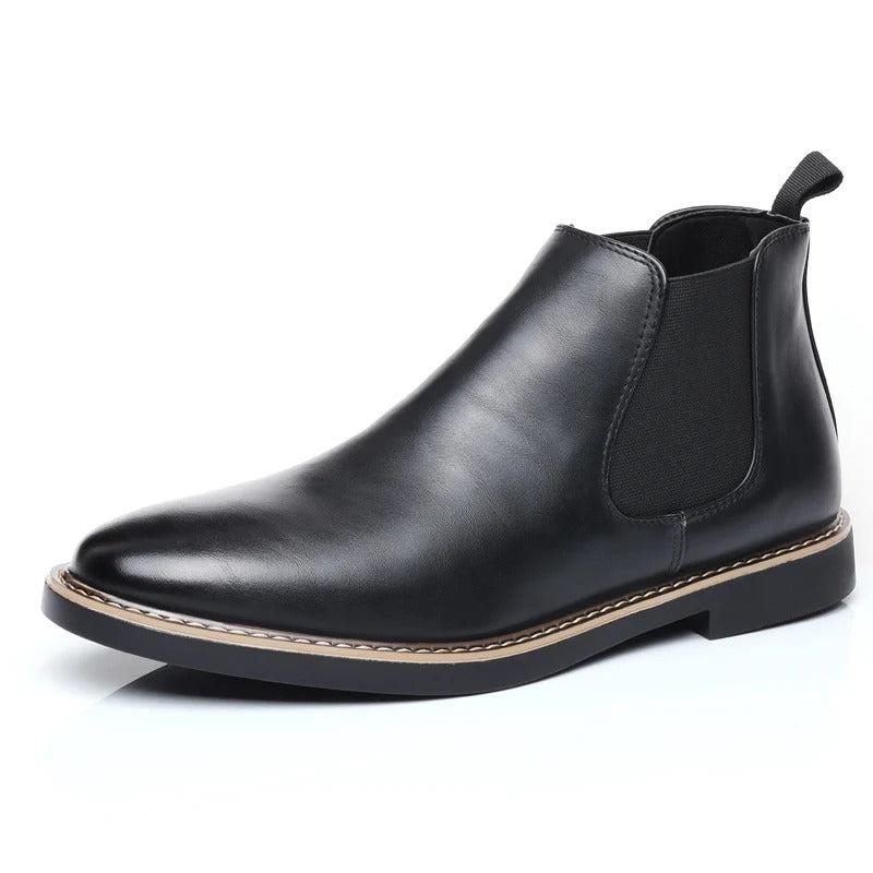 Eleganta svarta slip-on ankelstövlar för män, bekväma och mångsidiga.