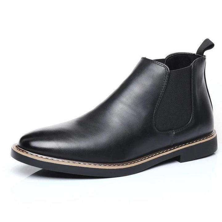 Eleganta svarta slip-on ankelstövlar för män, bekväma och mångsidiga.