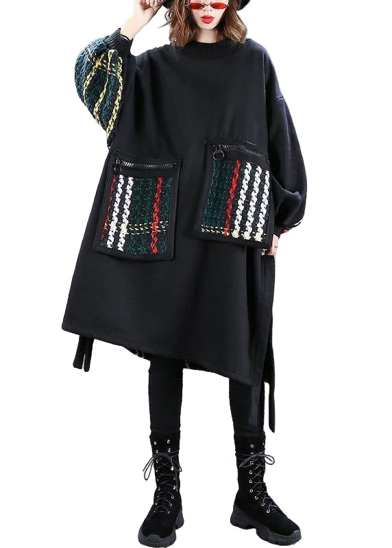 Chic överdimensionerad damklänning med trendig sidoöppning för en avslappnad men stilren look.
