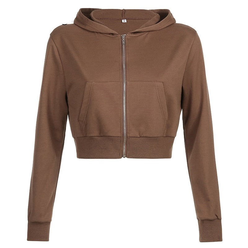 Dam croppad huvtröja med dragkedja, slim fit. Perfekt för träning och vardag.
