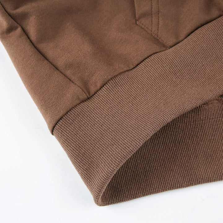 Sportig croppad huvtröja för dam med dragkedja, slim fit, perfekt för aktiv fritid.