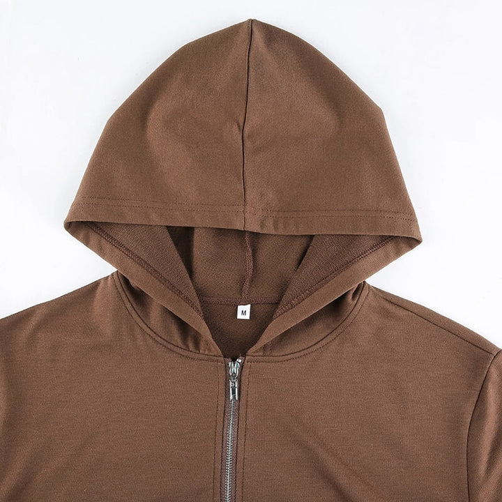 Moderiktig dam hoodie, croppad med dragkedja, slim fit för en trendig look.