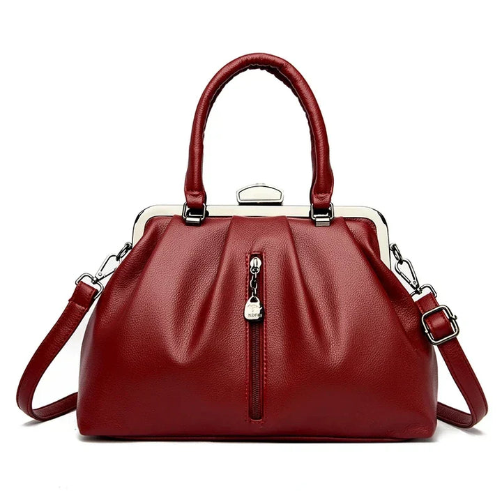 Elegant och trendig damväska i PU-läder. Mångsidig crossbody axelväska med justerbar rem.
