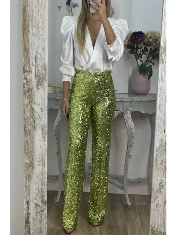 Dam festbyxor med glittrande paljetter, perfekta för kvällsevenemang och party. Eleganta & stilfulla.