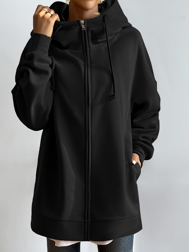Dam hoodie med dragkedja i mjukt tyg, perfekt för sport och vardag.