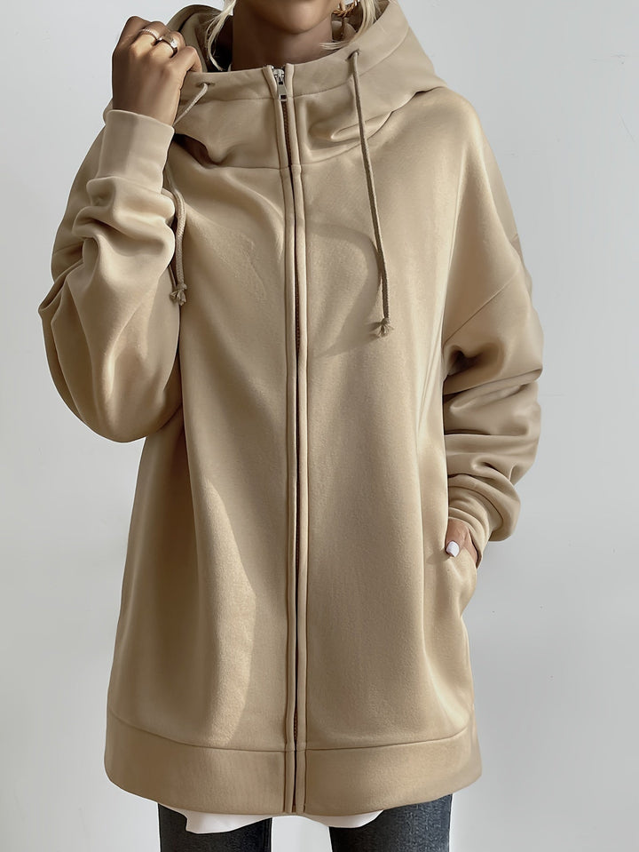 Modern dam sweatshirt med dragkedja, utmärkt för sport, vardag och lager-på-lager.