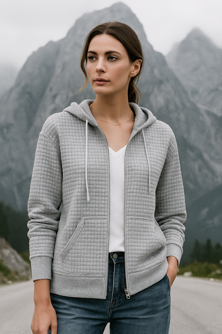 Bekväm dam hoodie väst med huva, våffeltextur för casual mode och sportig look.