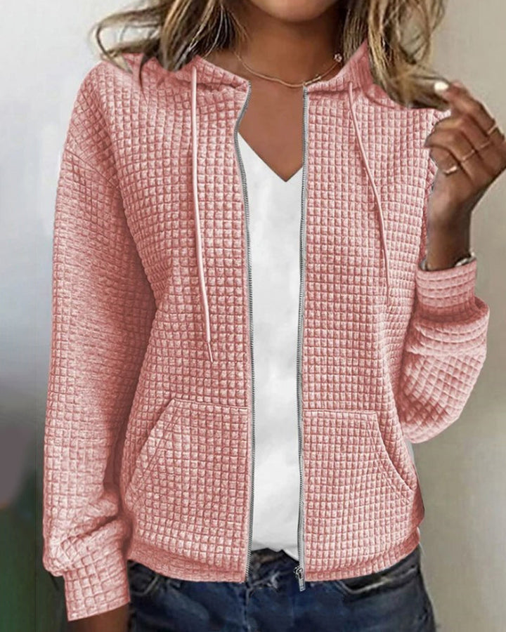 Modern damväst i våffelstruktur, en trendig hoodie utan ärm för kvinnor.