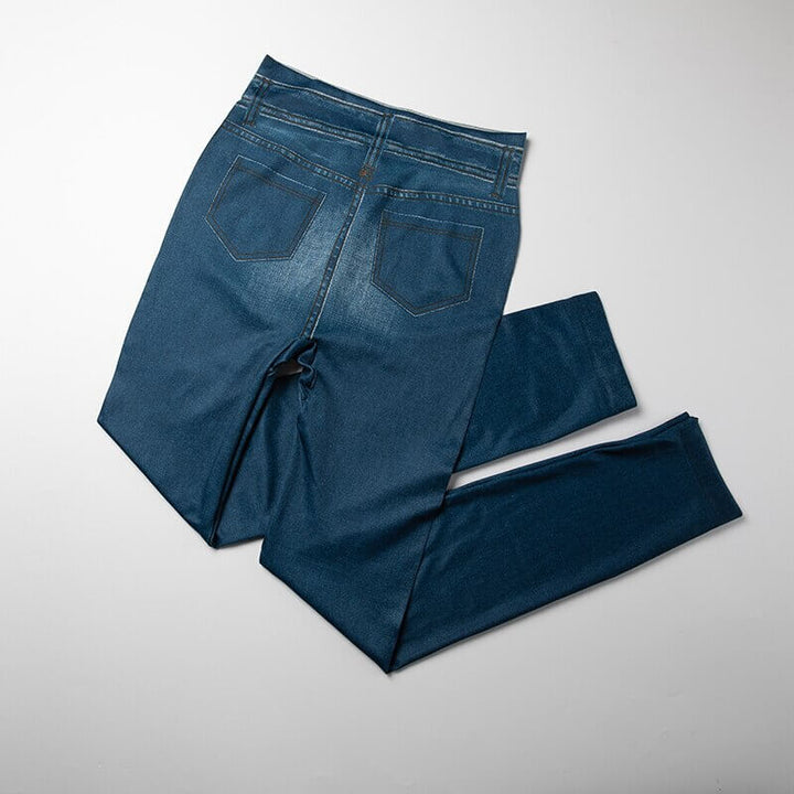 Dam stretchbyxor i jeansstil, hög midja, anpassade för kvinnor som söker komfort och mode.