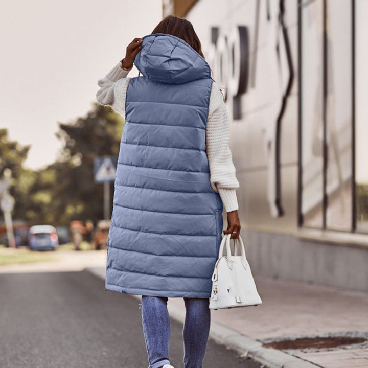 Trendig dam hoodie väst, lång modell, idealisk för en avslappnad urban look. Mångsidig höstmode.