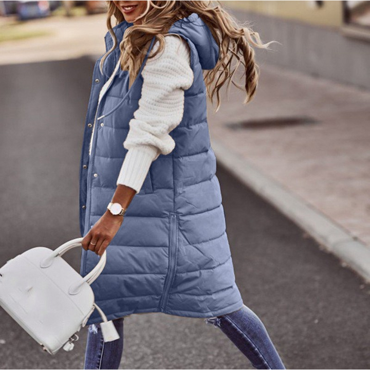 Mångsidig lång hoodie väst för dam, kombinerar bekvämlighet med urban stil. Perfekt för vardagsbruk.