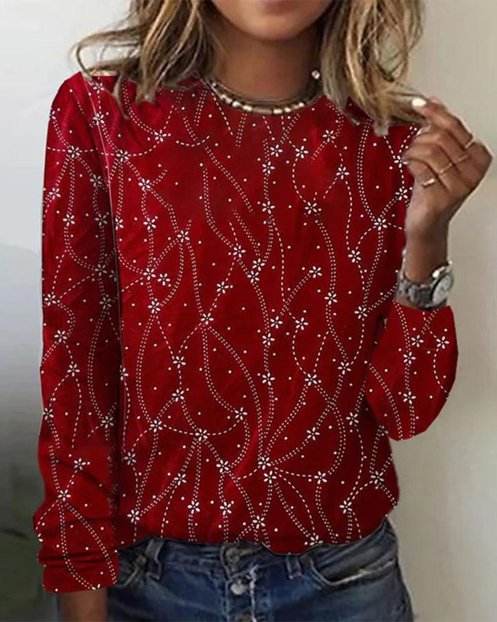 Stilren damtopp långärmad med unikt tryck, mångsidig för modern höst och vårmode, framhäver kvinnorsmode.