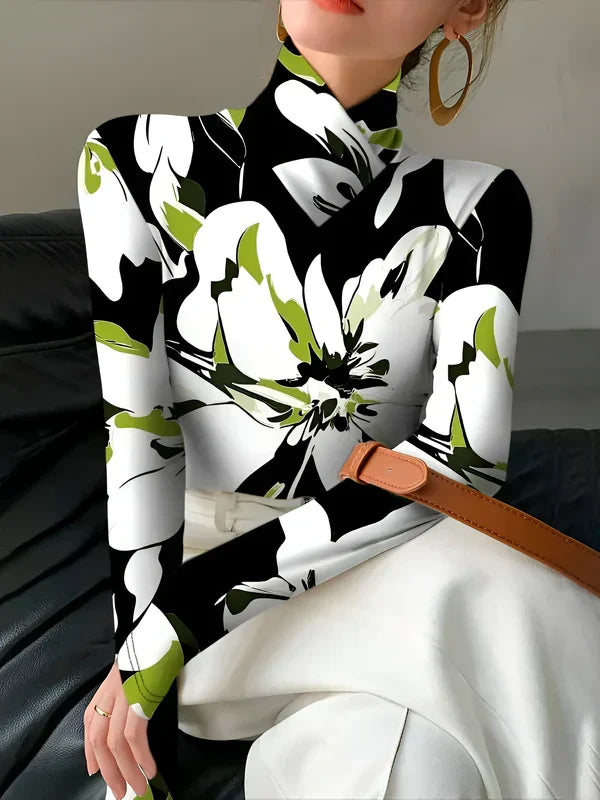 Damtopp: Långärmad turtleneck t-shirt med vackert blommigt tryck. Modern och mångsidig.