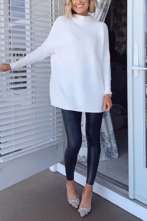 Ribbstickad Oversized Tröja. Dam, mockneck, avslappnad stil, mysig för vinterkylan.