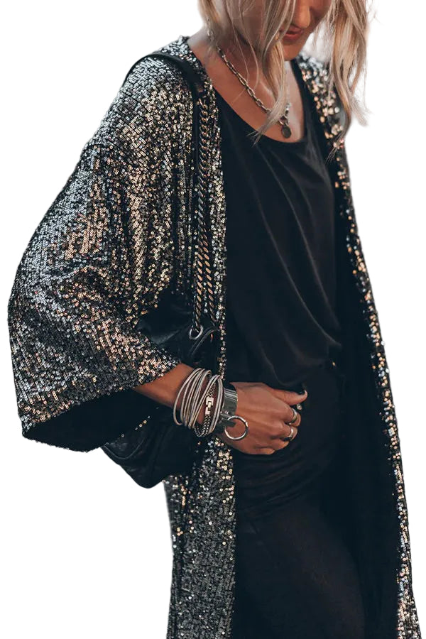 Dam paljettväst i glittrigt tyg, perfekt för fest. Stilfullt ytterplagg för kvinnor, glamourös look.